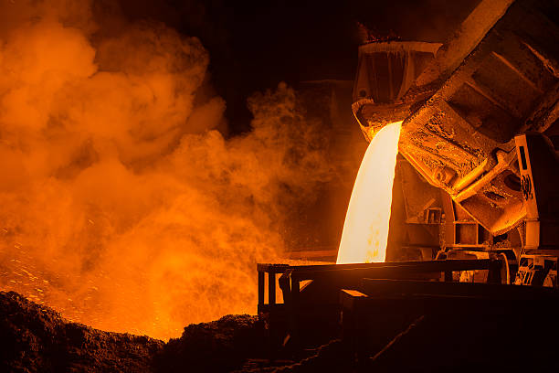 Steel plant very hot steel pouring in steel plant slag heap stock pictures, royalty-free photos & images
