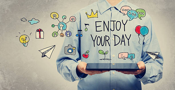 istock Enjoy Your Day concept with young man holding a tablet 498861320