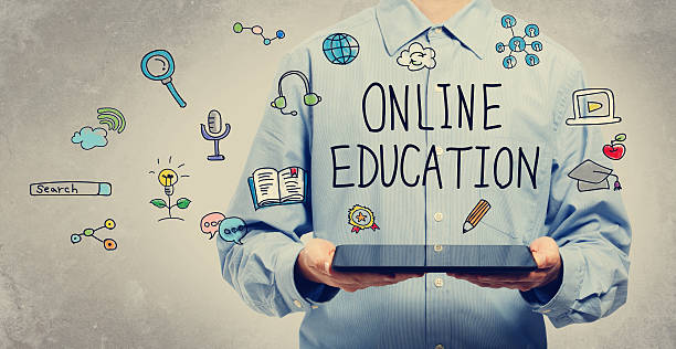 istock Online Education concept with young man holding a tablet 498861374