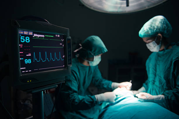 Surgeons team working stock photo