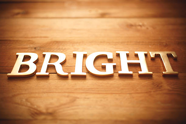 istock Golden bright text on wood 498863414