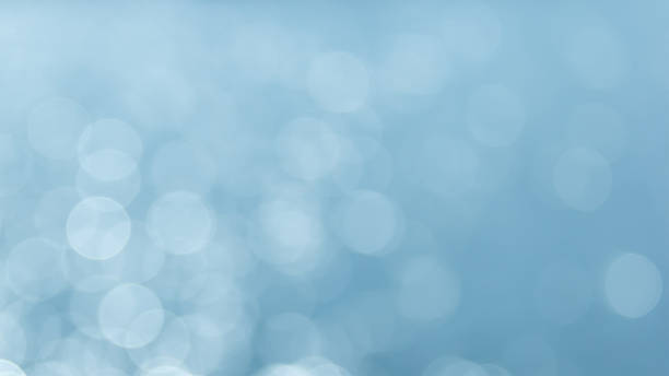 istock Abstract circular bokeh background of Light shining on the river 498879735
