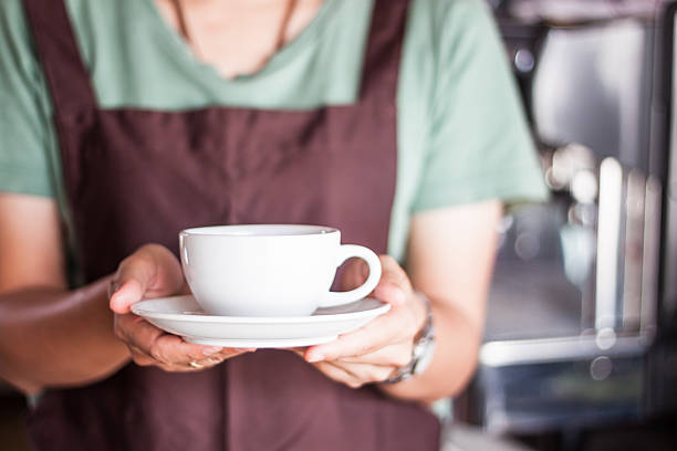istock Barista serving freshly brewed coffee 498881697