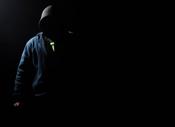 istock alien person in the dark forest 498882662