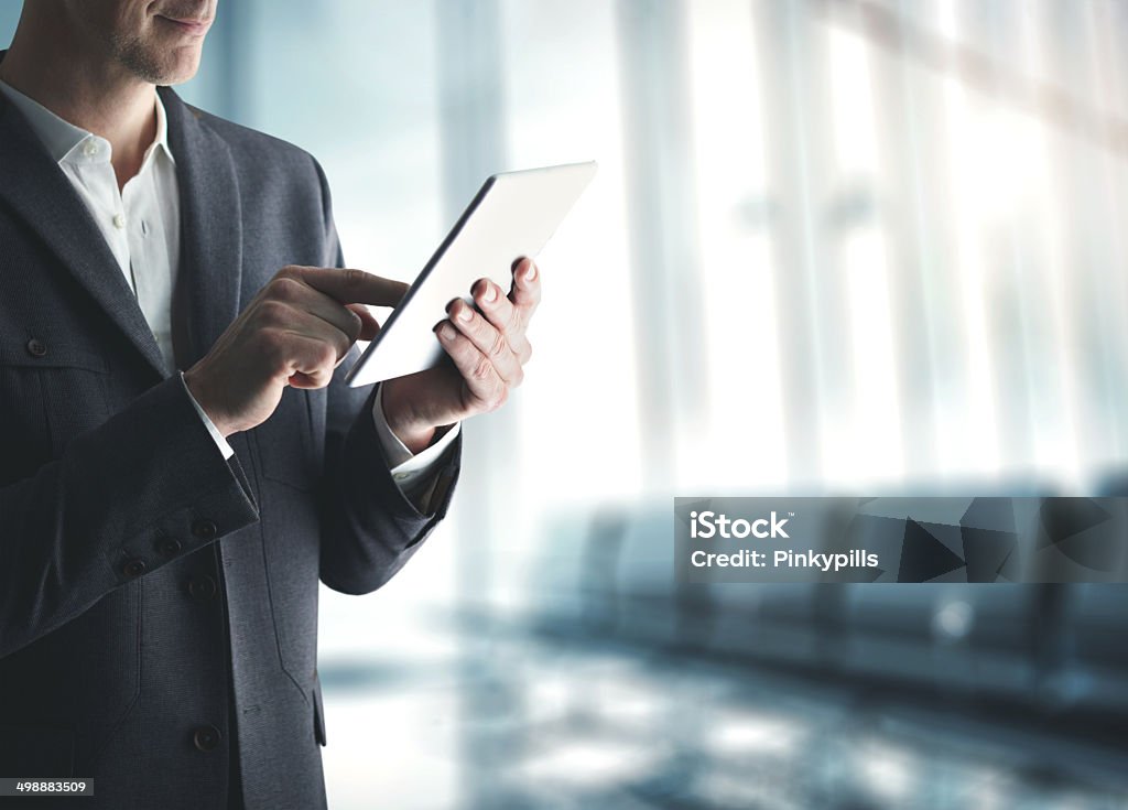 businessman with digital tablet Adult Stock Photo