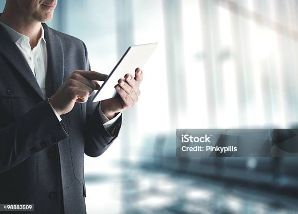 Businessman With Digital Tablet Stock Photo - Download Image Now - Adult, Business, Businessman