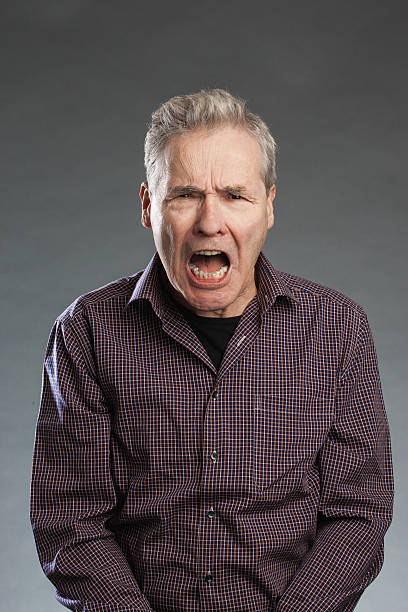 istock Senior man portrait, screaming angrily 498884986