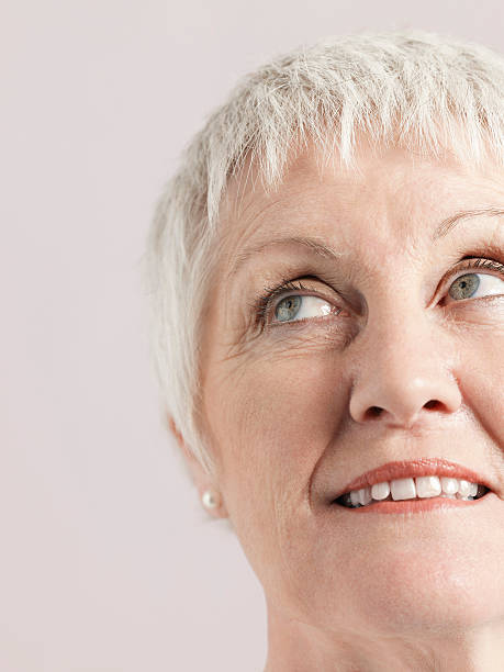 istock Smiling Senior Woman Looking Away 498885535