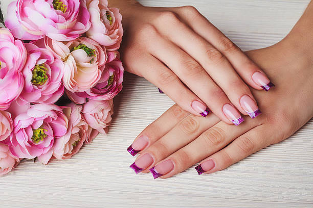 istock French nail art in purple color 498886964