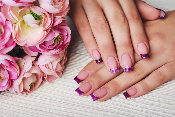 istock French nail art in purple color 498887014