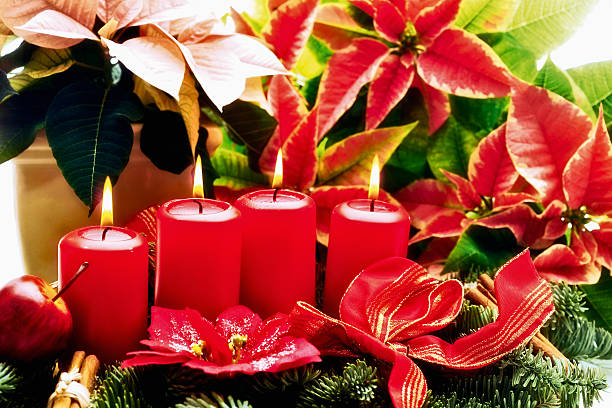 Christmas floral arrangement with red candels