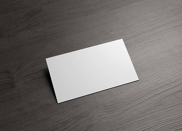 istock business card horizontal 45degree wood table 498889344