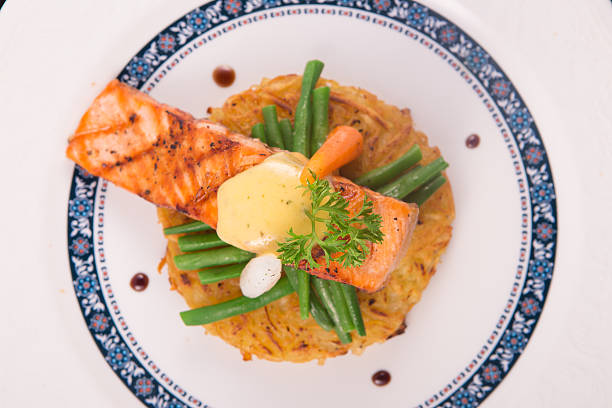 istock Grilled Salmon rosti with vegetables and hollandaise sauce 498889586