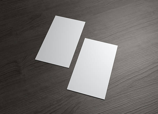 istock Vertical Business cards on wood table 498890626
