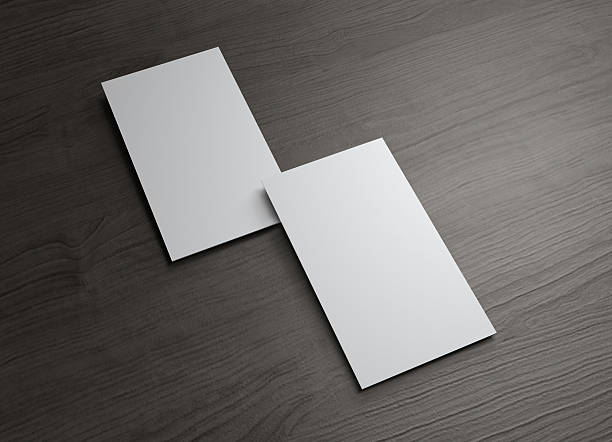 Vertical Business cards overlap on wood table