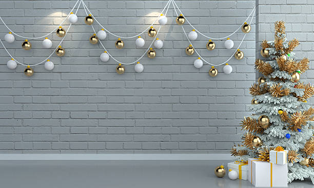 istock Christmas tree and gifts on brick white wall background. 498890964