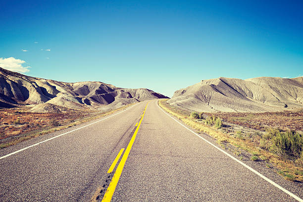 istock Vintage toned endless country highway, USA 498894368
