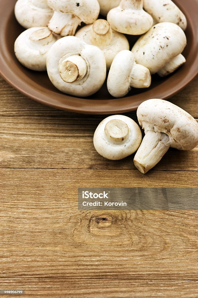 Fresh mushrooms on a wooden board Autumn Stock Photo