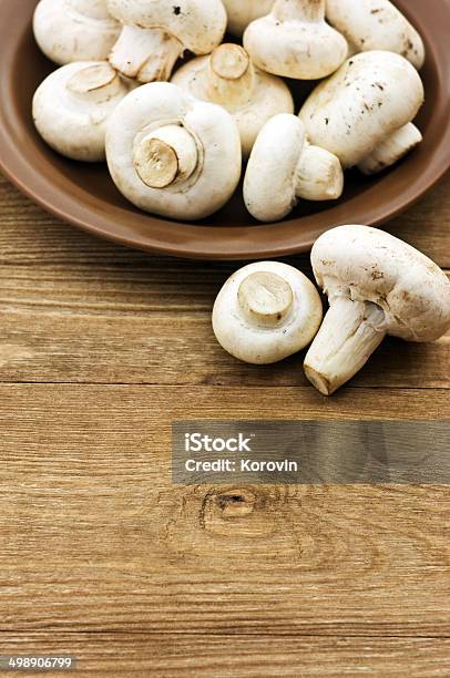 Fresh Mushrooms On A Wooden Board Stock Photo - Download Image Now - Autumn, Brown, Cooking