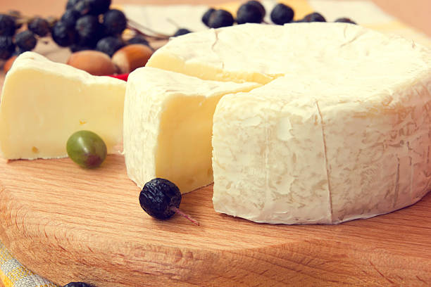 istock camembert on a wooden board 498906871