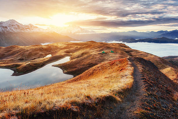 istock The path leading ridge pass Goulet at sunset. Upper Svaneti, 498908632