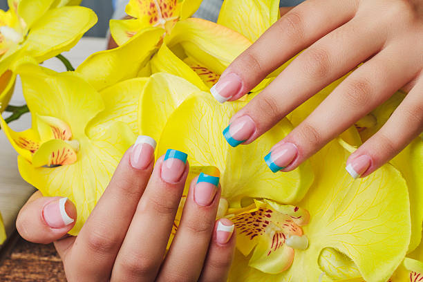 istock French nail art in light blue and white color 498910138