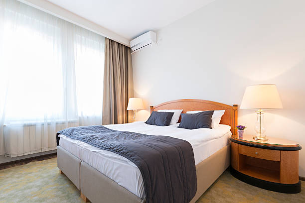 istock Interior of a double bed hotel room 498918294