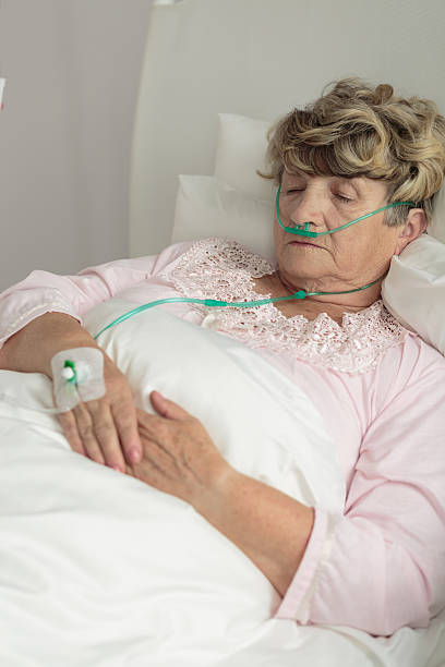 istock Terminally ill senior woman 498919346