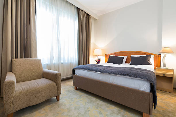 istock Interior of a double bed hotel room 498920068