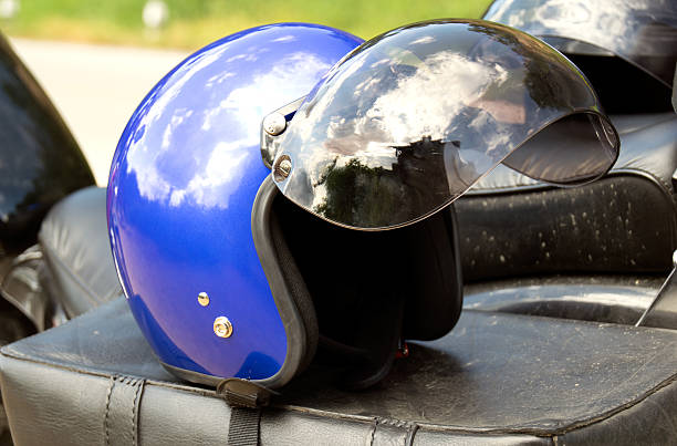 istock Blue helmet Put on the seat of a motorcycle chopper 498921148