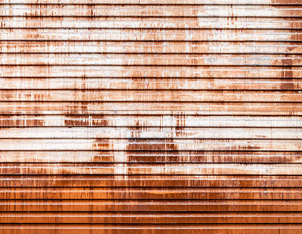 istock Old Garage Roller Door Streaked with Rust and Paint 498924231