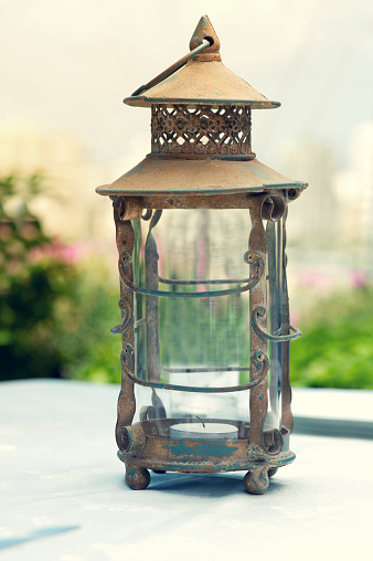Retro vintage candle lantern isolated on white background