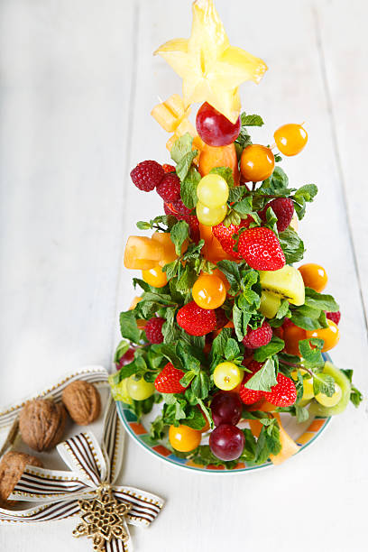 istock Burning candles with 2015 year and with fruit tree 498927333