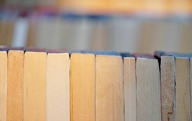 istock close up old books in row 498927825
