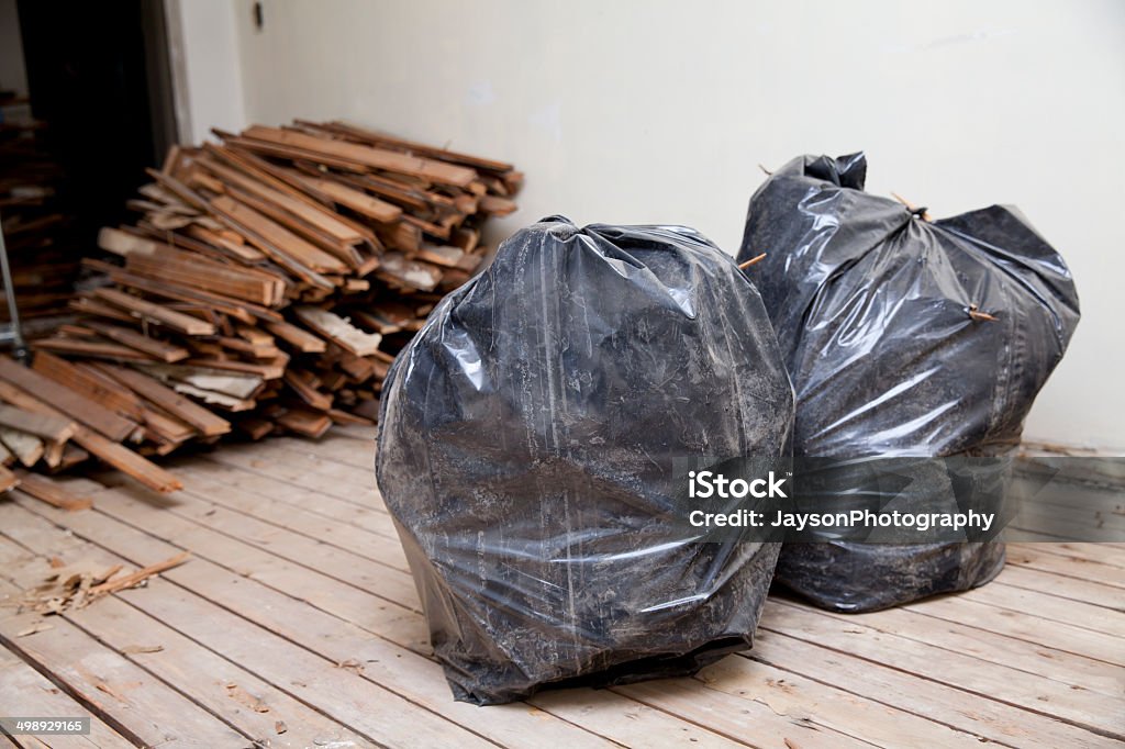 energy Stevenson mud Two Trash Bags Stock Photo - Download Image Now - Construction Site,  Cleaning, Construction Industry - iStock