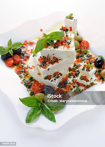 Feta Cheese In Oil With Basil Stock Photo - Download Image Now - 2015, Appetizer, Basil