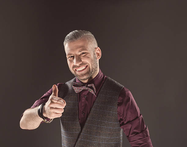 istock Successful bearded man wearing bow tie and tweed vest 498942910