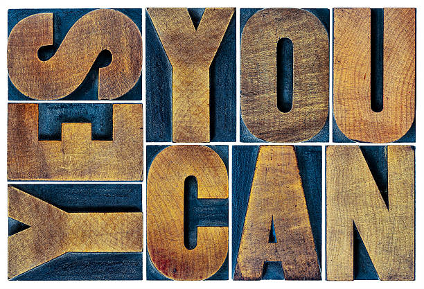 istock yes you can motivation phrase in wood type 498943816
