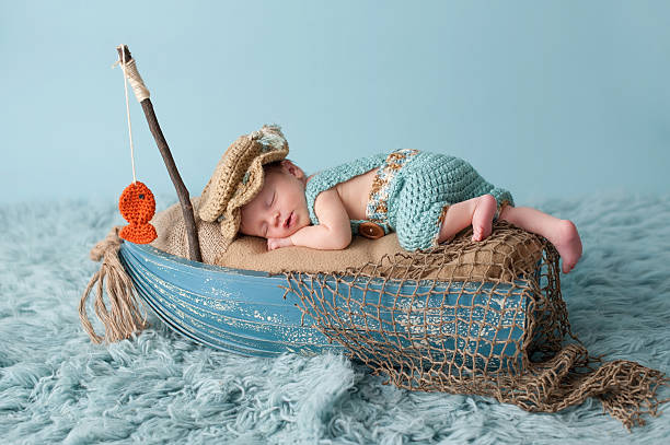 Newborn Baby Boy In Fisherman Outfit Stock Photo - Download Image