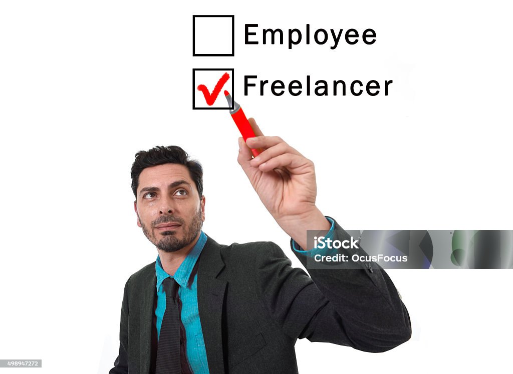 businessman choosing freelancer to employee option ticking box with marker businessman choosing freelancer to employee option at work formular ticking box with red marker on glass isolated on white in self employment versus company salary and freelance working concept 2015 Stock Photo