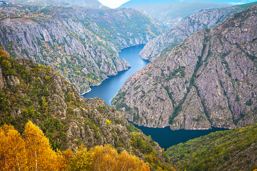 Autumnal landscape of Ribeira Sacra (Sil River Canyons) in Ourense (Galicia) Spain. Dondel the river has excavated for centuries on the rocky granite walls to shape the landscape at will natural. Beautiful place inside Galicia in rural mountain
