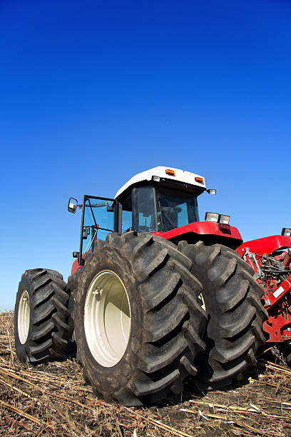istock Powerful agricultural tractor in a field 498950228
