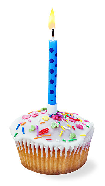 istock cupcakes with a birthday candle isolated 498950755