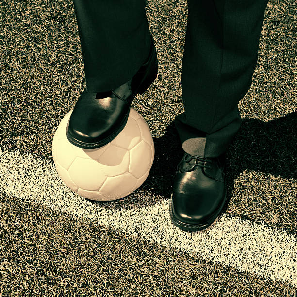 istock Businessman with a soccer ball - retro style 498951029