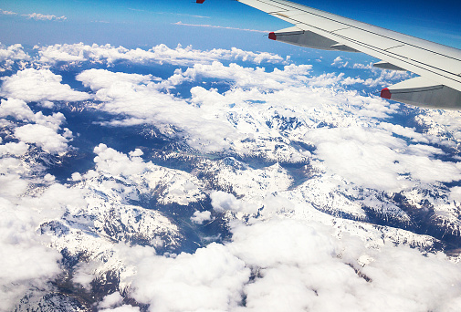 Flight over the Alps,peaks visible glacier. Italy