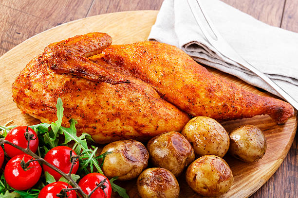 istock half baked chicken with new potatoes 498952093