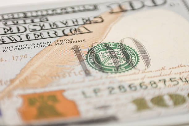 istock hundred dollar bill, macro photography 498952115