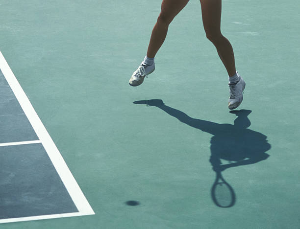 istock Woman Playing Tennis 498954132