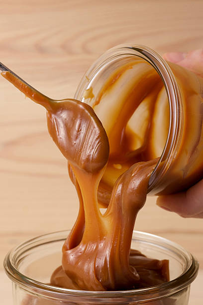 istock salt caramel in a jar and spoon 498954324