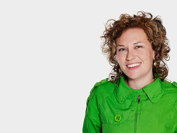 istock Woman In Green Jacket Looking At Camera 498954545